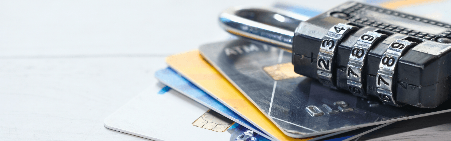 Padlock on credit cards, symbolizing Data Privacy Week